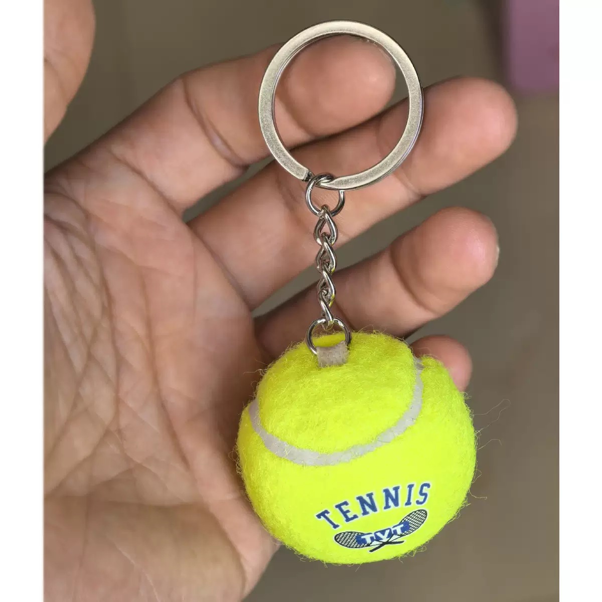 Schlüsselanhänger Tennisball mit Logo als Werbeartikel